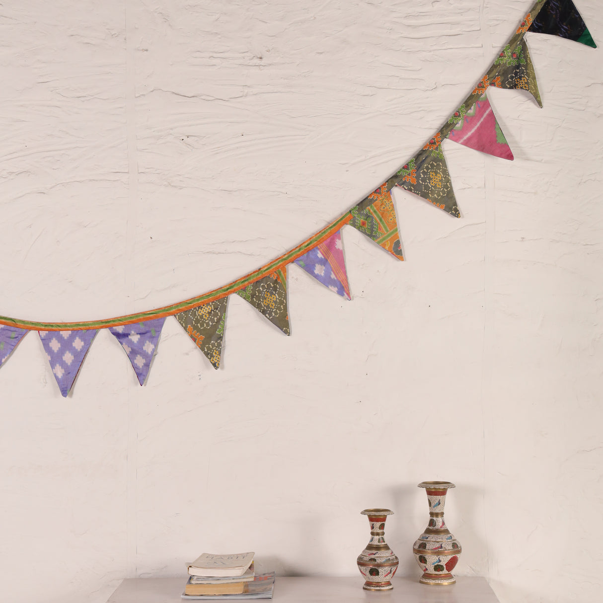 Bunte Boho Girlande mit Fähnchen für ein Zuhause mit Seele