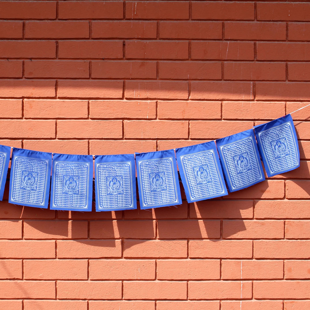 Tibetische Gebetsfahne mit Medizin Buddha in Blau